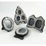 Four Elizabeth II silver photo frames