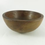 A 19th century turned elm dairy bowl
