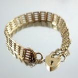 Two 9 carat gold gate link bracelets