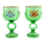 A pair of German enamelled glass marriage drinking glasses
