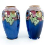 A pair of Royal Doulton stoneware vases