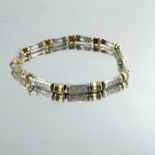 A 14 carat gold and diamond bracelet