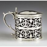 John Harrison, Sheffield 1864, a Victorian silver mustard pot, cylindrical form, reticulated with tw