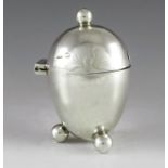 Mappin and Webb, Sheffield 1898, a Victorian novelty silver mustard pot, in the form of an egg, on t