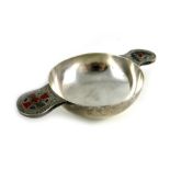 An Arts and Crafts, Scottish hardstone mounted silver quaich, James Fenton
