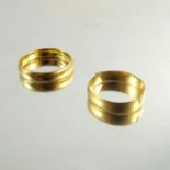 Two 22ct yellow gold wedding bands