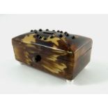 A 19th century miniature tortoiseshell and silver strung box