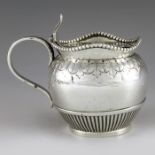 Martin and Hall, Sheffield 1886, a Victorian silver mustard pot, ovoid form with conical ogee rimmed