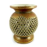 A Japanese Satsuma reticulated spherical footed vase