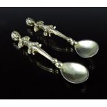 A pair of Victorian cast silver gilt salt spoons, Frederick Elkington, London 1884, in the Renaissan