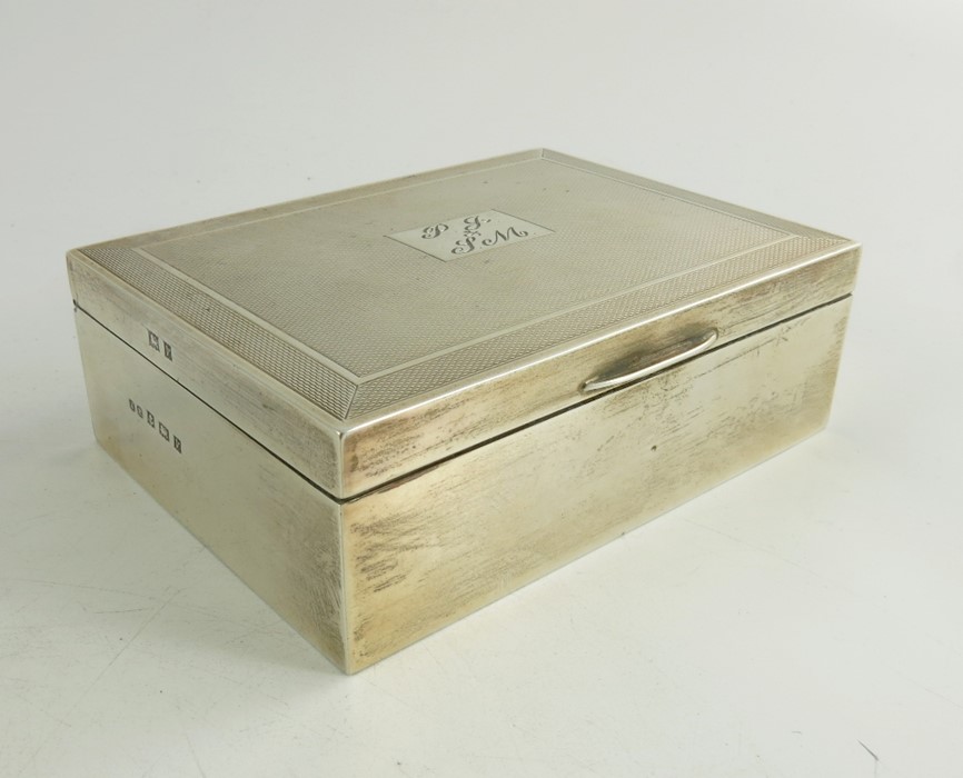 An Elizabeth II silver cigarette box, John Rose