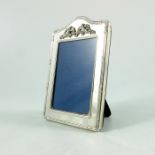 A small Elizabeth II silver photo frame, Ari Norman