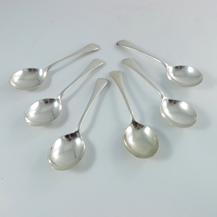 A set of six Elizabeth II silver soup spoons, James Dixon and Sons