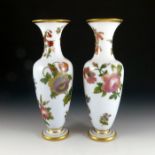 A pair of Baccarat enamelled opaque glass vases