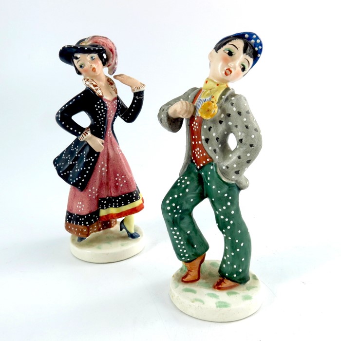 A pair of Goebel figures, pearly boy and girl