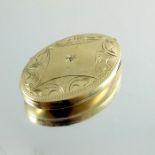 A 9 carat gold oval locket pendant