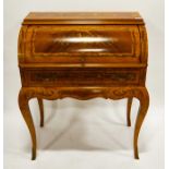 A Louis XV style inlaid satinwood and kingwood rolltop desk