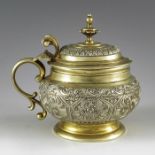 George Fox, London 1870, a Victorian silver gilt mustard pot, footed squat ovoid form, chased and en