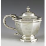 Daniel nd John Wellby, London 1896, a Victorian Britania silver mustard pot, footed octagonal cup fo
