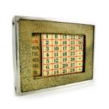 An Art Deco silver and shagreen desk calendar