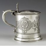 Joseph Angell, London 1857, a Victorian silver mustard pot on a rising circular foot, the body engra