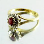 A ruby and diamond cluster ring