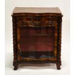 An early Victorian rosewood cabinet