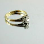 A diamond solitaire ring