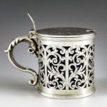 George Unite, Birmingham 1854, a Victorian silver mustard pot, cylindrical form, chased and reticula