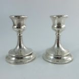 A pair of George V silver dwarf candlesticks, Spurrier and Co.