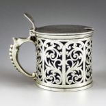 George Unite, Birmingham 1855, a Victorian silver mustard pot, cylindrical form, reticulated and etc