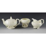 A Belleek Echinus three piece tea set, including teapot, jug and bowl, relief moulded as sea urchins