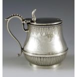 George Fox, London 1872, a Victorian silver mustard pot, baluster form, half reeded the rim with eng