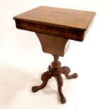A Victorian figured walnut pedestal work table, circa 1850