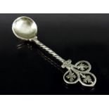 A Victorian Gothic Revival silver salt spoon, Jehoiada Alsop Rhodes, Sheffield 1872, the twisted ste