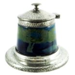William Moorcroft for Liberty and Co., a Moonlit Blue Tudric pewter mounted inkwell