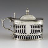 Nathan and Hayes, Chester 1897, a Victorian silver mustard pot, straight sided oval form, reticulate