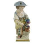 A Meissen figure of a young girl collecting grapes