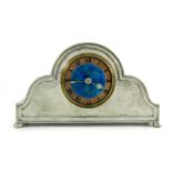 Liberty and Co., a Tudric pewter and enamelled mantle clock