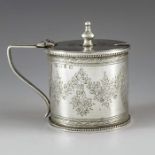 Thomas Hayes, Birmingham 1890, a Victorian silver mustard pot, cylindrical form, engraved with flora