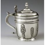 Holland, Aldwinckle and Slater, London 1895, a Victorian silver mustard pot and spoon, footed beaker