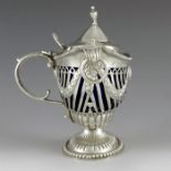 Nathan and Hayes, Birmingham 1897, a Victorian silver mustard pot, reticulated and embossed, double