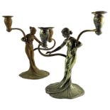 WMF, a pair of Jugendstil silver plated figural candelabra, model 269 and 269A, twin branch form, ra