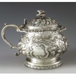 Joseph Angell, London 1826, a George IV silver mustard pot, footed squat baluster form, embossed and