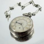 A large Victorian silver pocket watch on chain