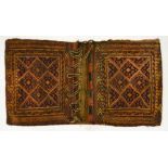 A Caucasus tribal saddle bag, 160 x 90 cm