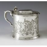 Henry Holland, London 1858, a Victorian silver mustard pot of cylindrical form with bright engraved