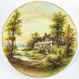 R.Rushton for Royal Worcester a hand painted and gilded cabinet plate
