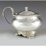 T Cox Savory, London 1828, a George IV silver mustard pot, ovoid form with everted gadrooned rim, on