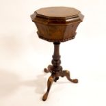 A Victorian figured walnut pedestal teapoy